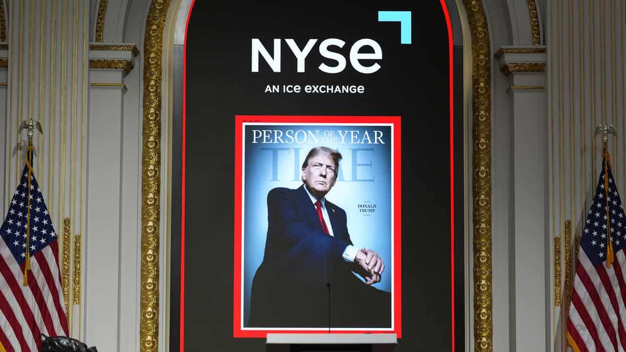 Time's Person of the Year cover at the New York Stock Exchange