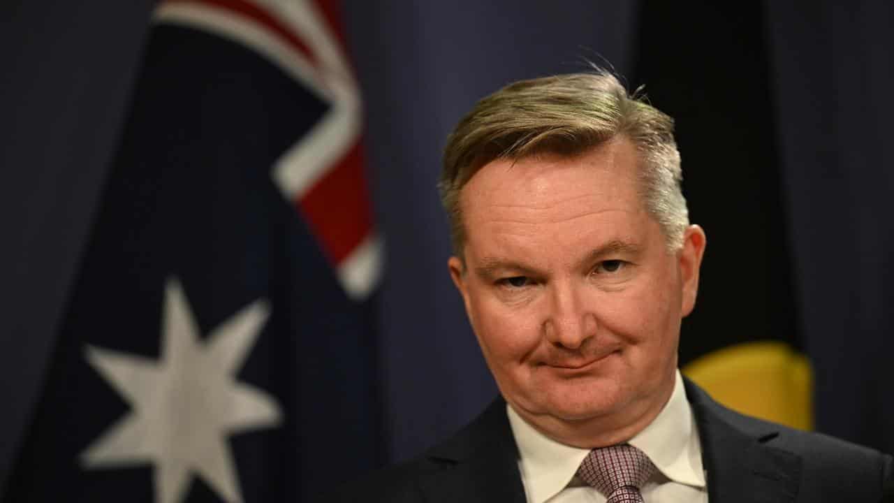 Minister Chris Bowen speaks during a press conference