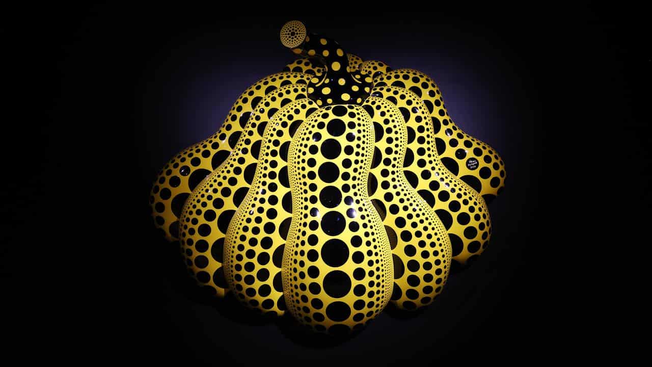 Giant yellow and black polka dot pumpkin