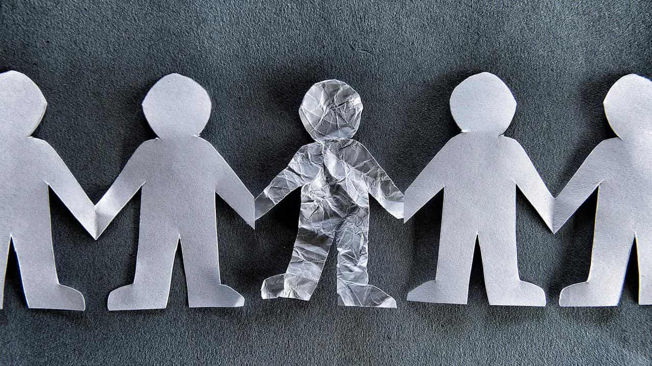 cutout of children holding hands