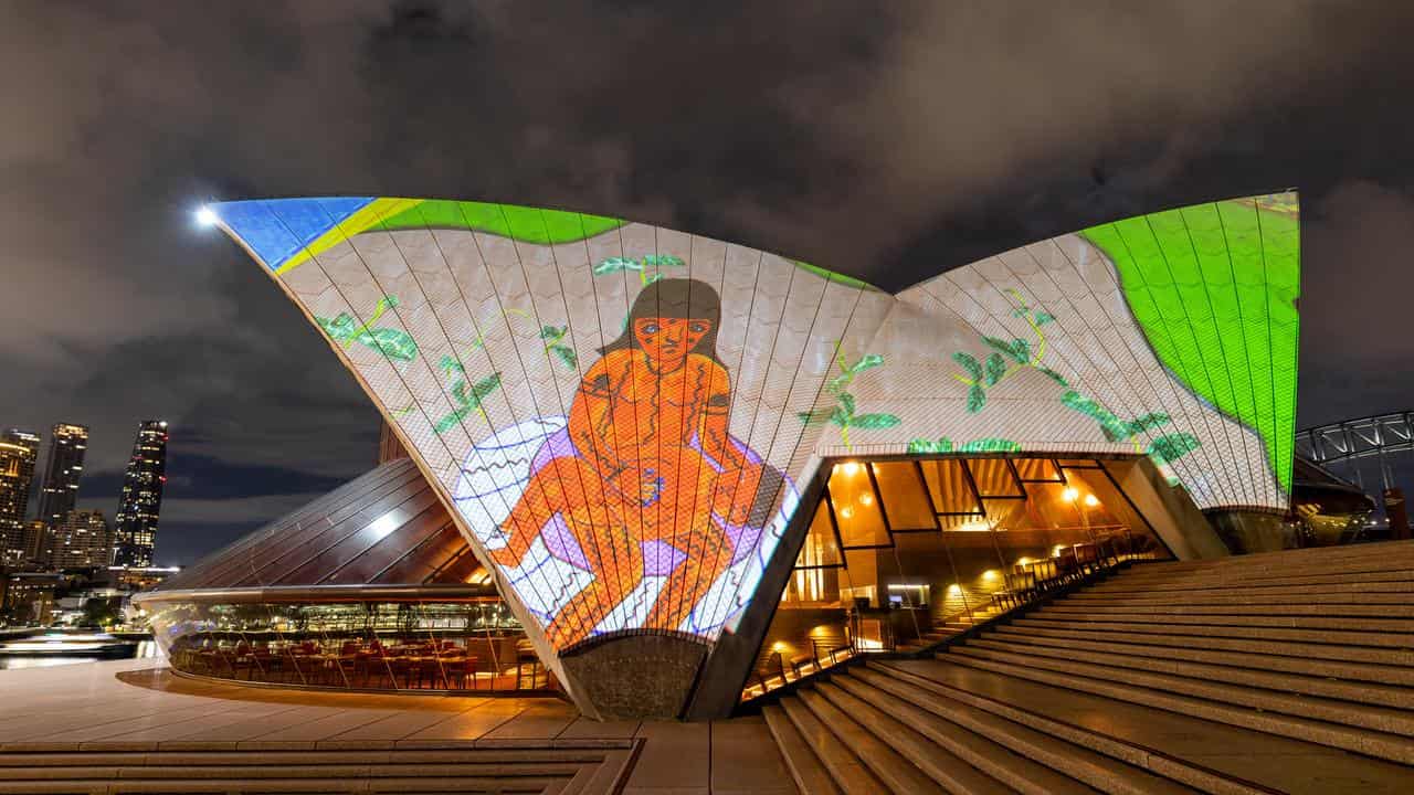 Joseca Mokashesi Yanomami work projected onto Sydney Opera House