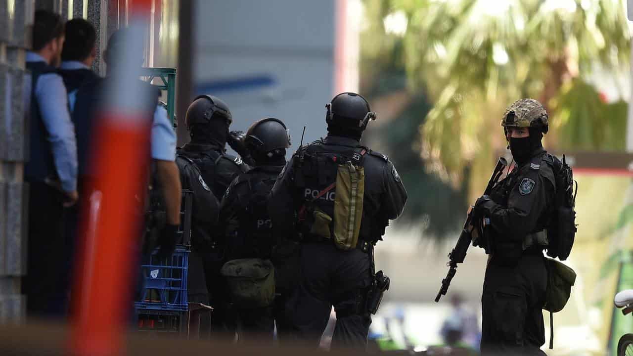 Police outside the Lindt Cafe in Sydney during the siege in 2014