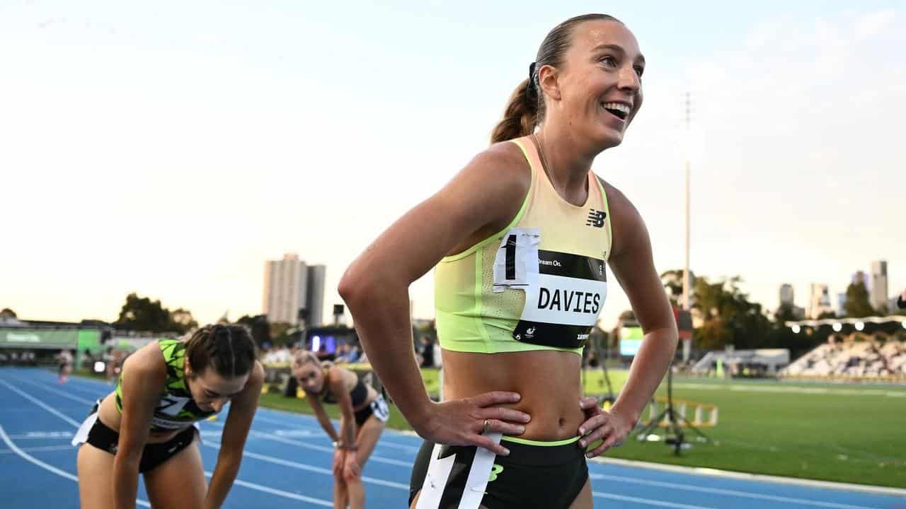 Rose Davies celebrates winning the women’s 10000m.