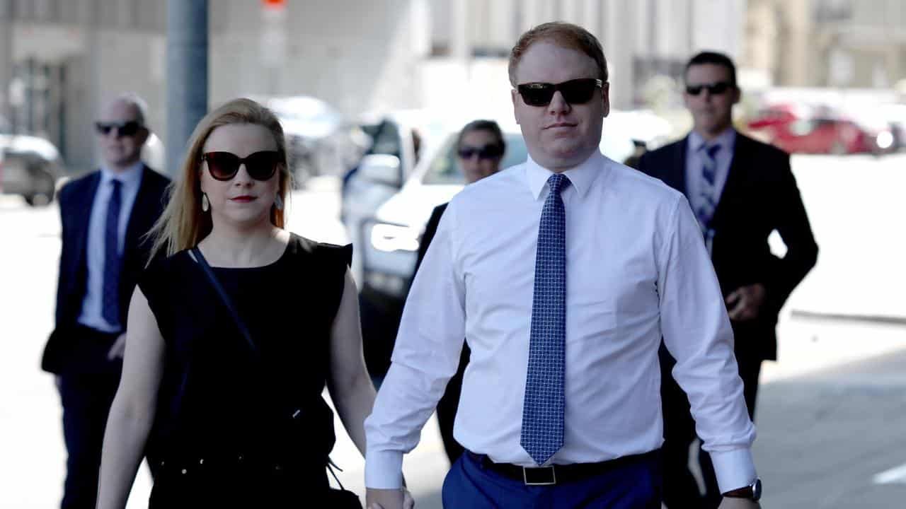 Man and Woman walking to court