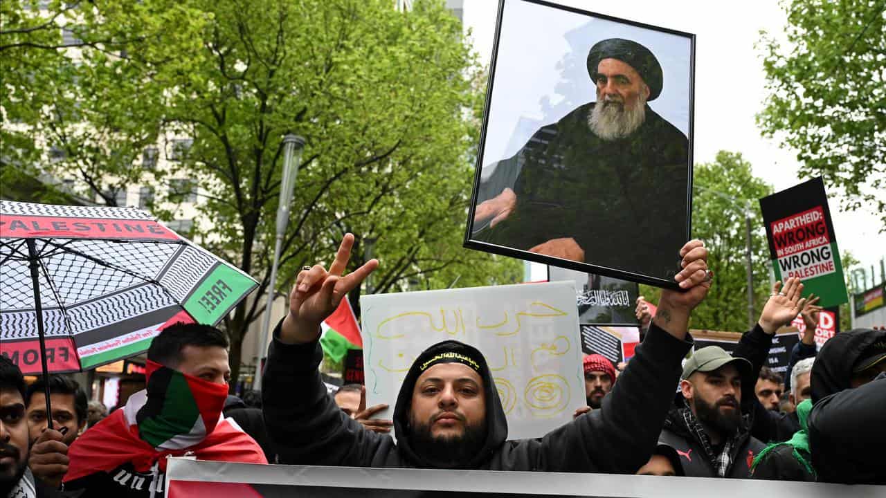 Protesters march during a Pro-Palestine rally