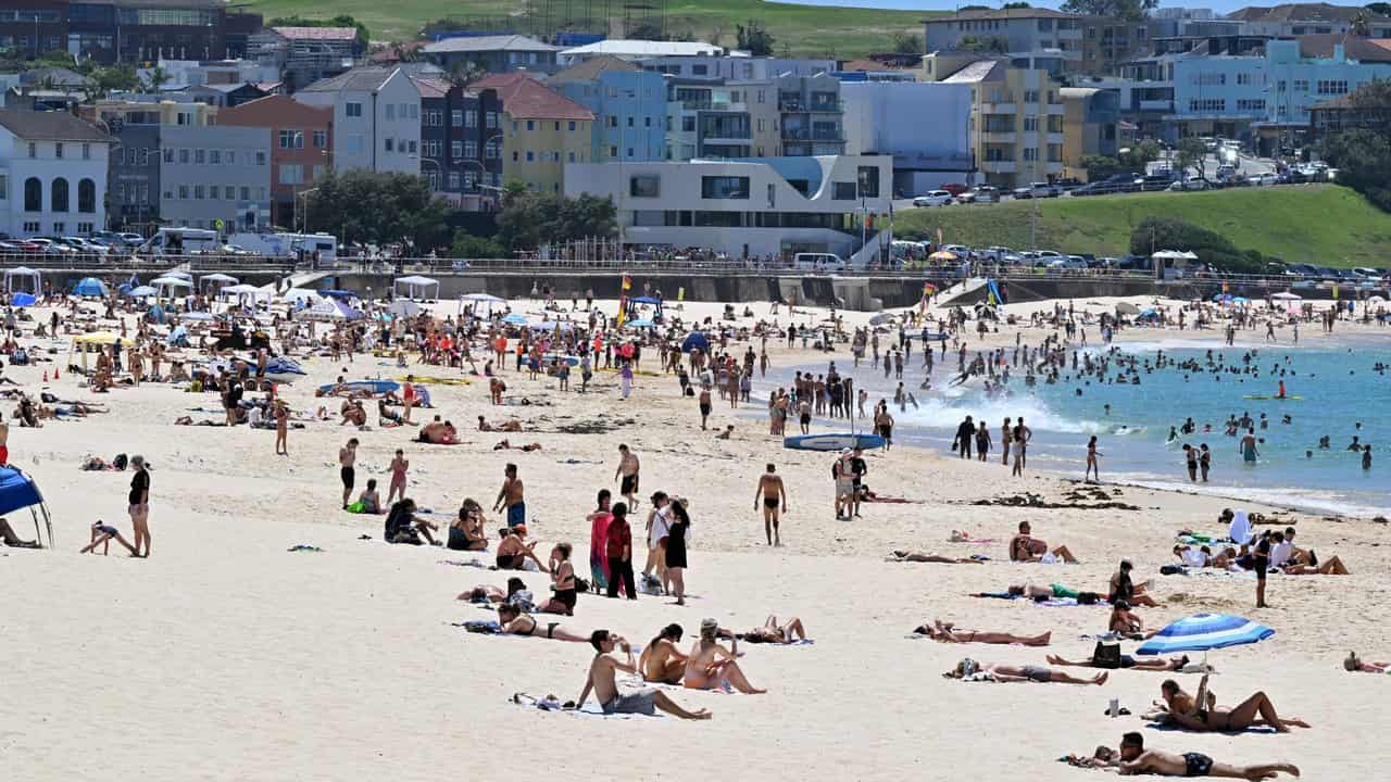 Beachgoers are seen at Bondi Beach in Sydney,