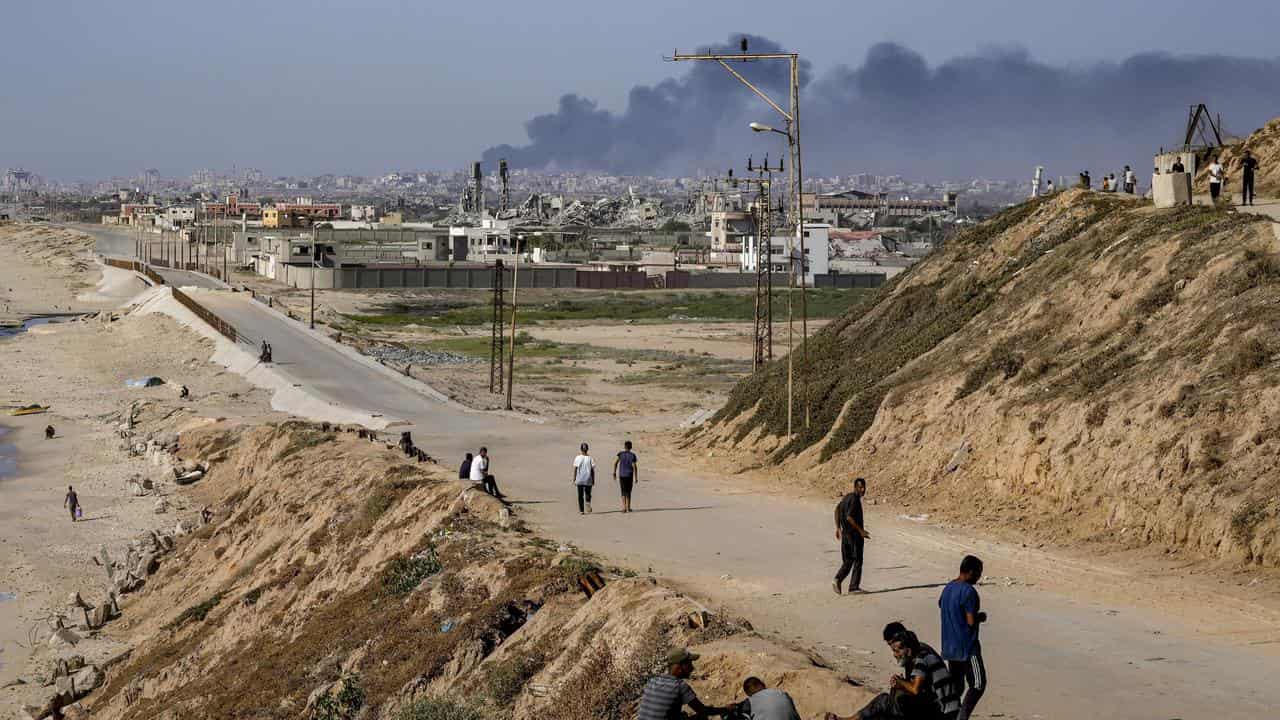 Smoke rises after an Israeli air strike in central Gaza