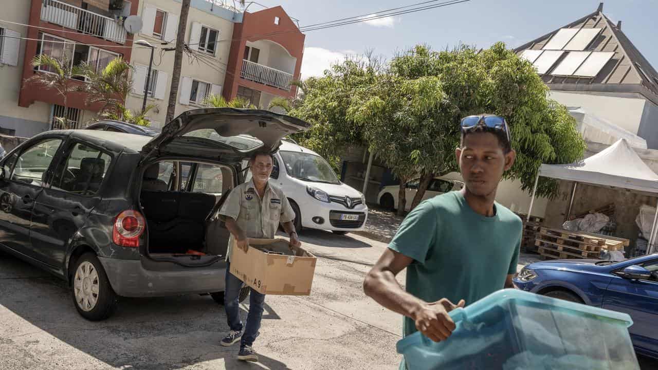 People in Reunion prepare goods