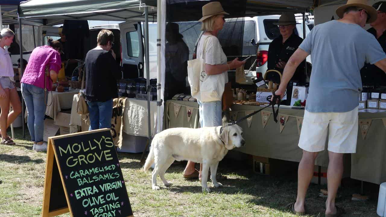 Customers line up at markets