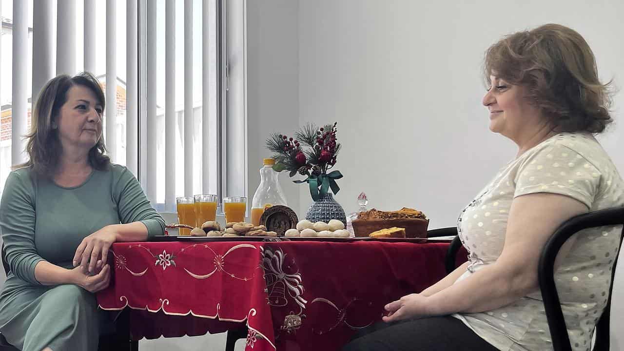 Nevart and Silva sitting at a table