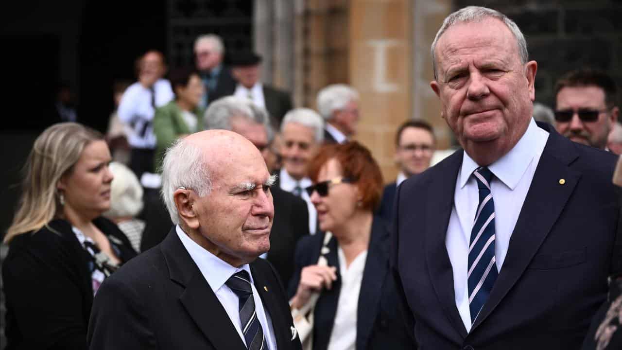 Former PM  John Howard (left) and former treasurer Peter Costello