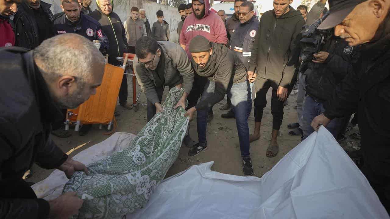 Bodies of victims of an Israeli strike on a home in Deir al-Balah