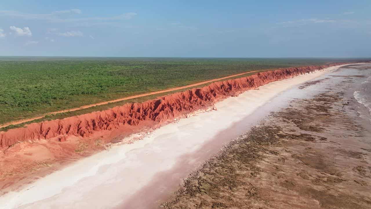 An aerial drone view of the pindan cliffs coastline at Walmadany