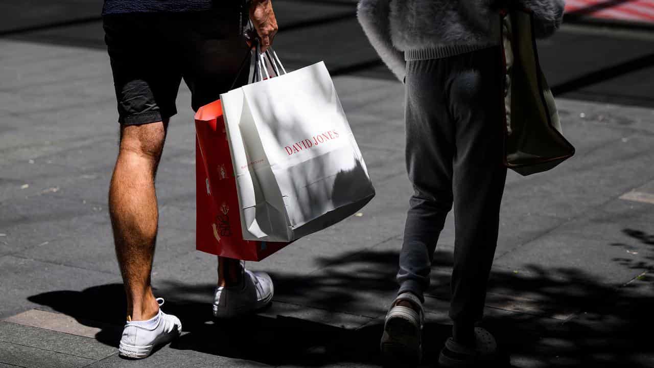 People carrying shopping bags 