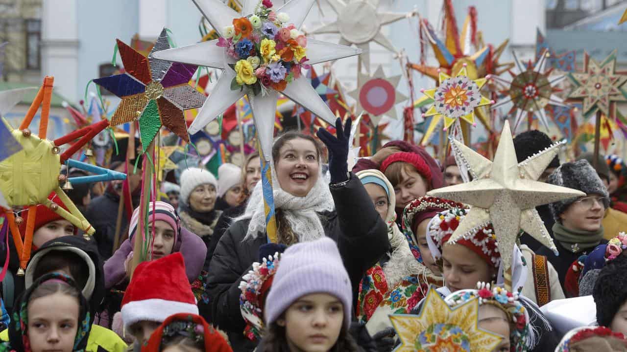 Ukrainians sing Christmas carols in downtown Kyiv