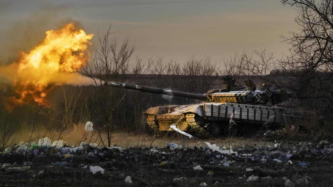 A Ukrainian tank fires at Russian positions in Chasiv Yar,