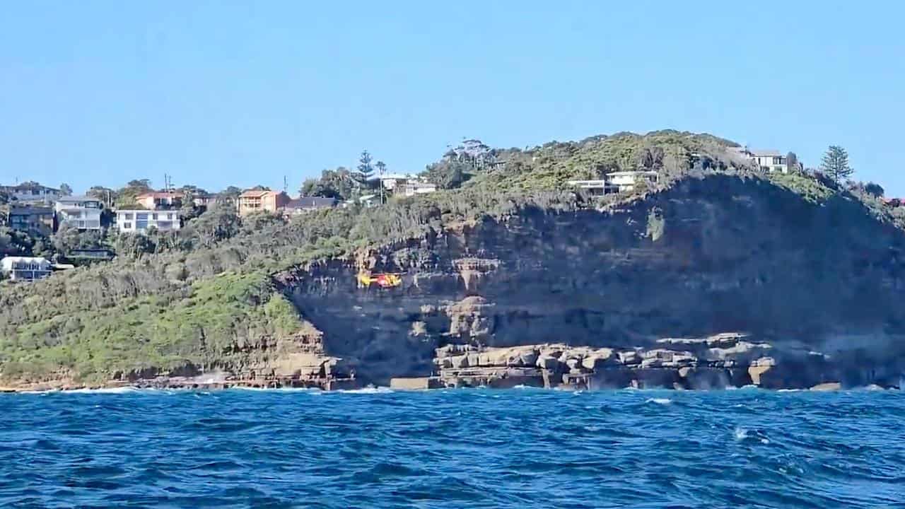 Search for a missing boy at a rock shelf at North Avoca Beach