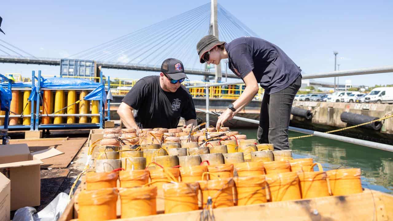 Fireworks being prepared on a barge in Sydney Harbour