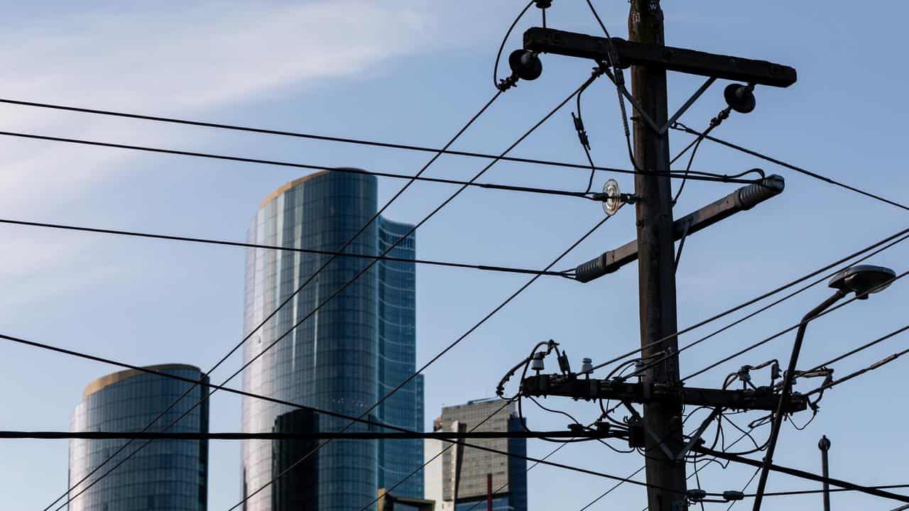 Electricity poles and wires are seen in Melbourne