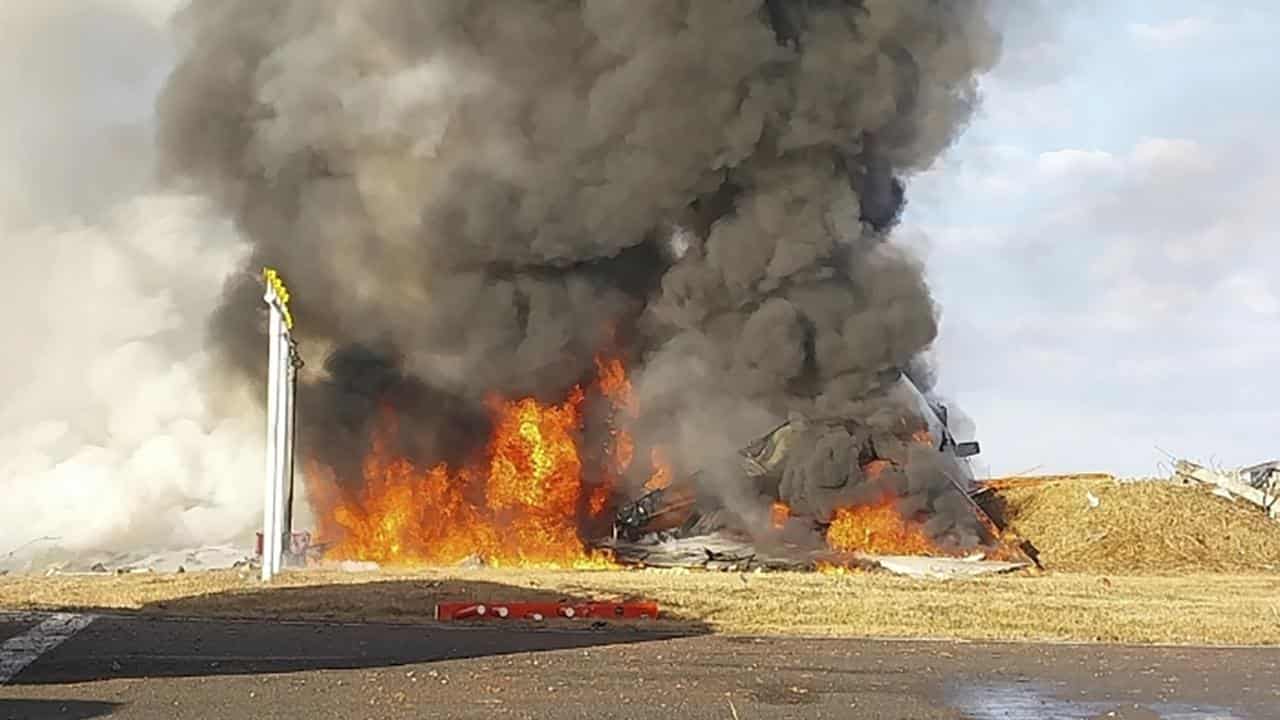 A plane is in flames at the Muan International Airport , South Korea