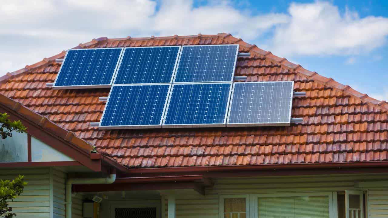 Solar panels in a home's roof (file image)