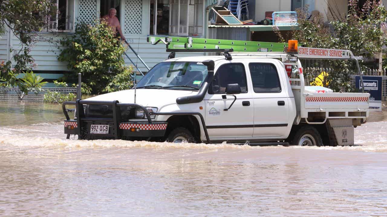 An SES vehicle drive through floodwaters (file image)