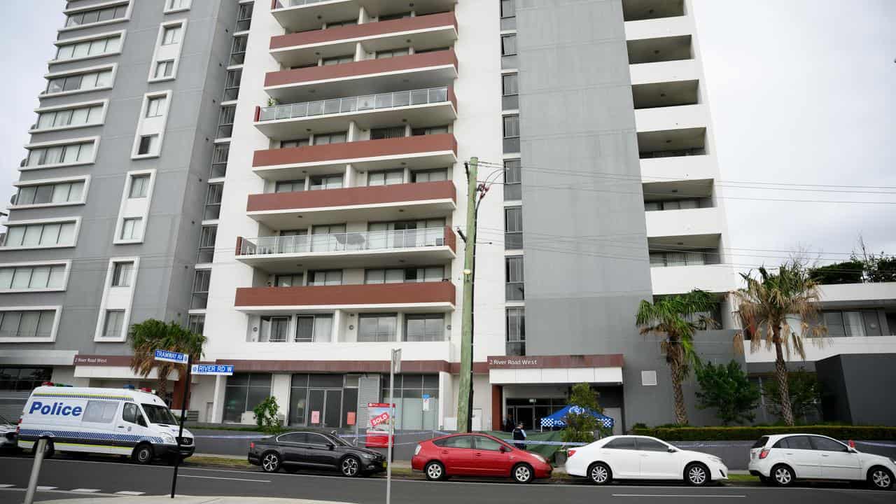 Police outside an apartment building in Parrammatta