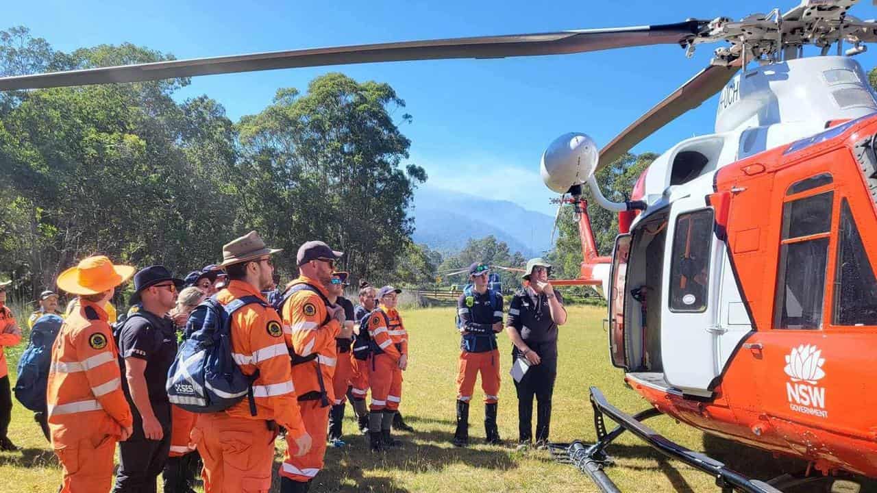 SES personnel conducting a search for a missing hiker