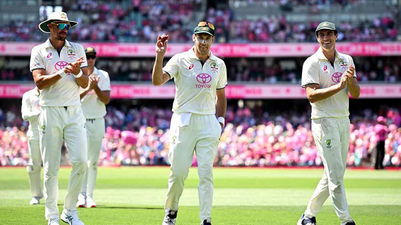 Mitchell Starc, Scott Boland and Pat Cummins.