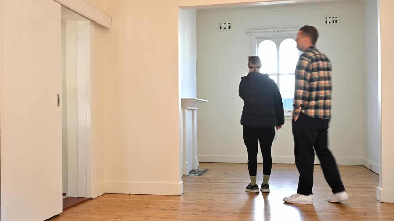 Buyers inspecting a house