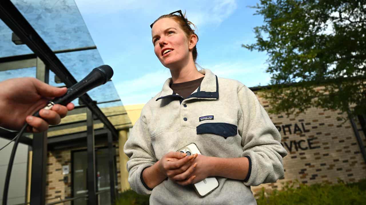 Jess Dart speaks to the media outside Cooma Hospital