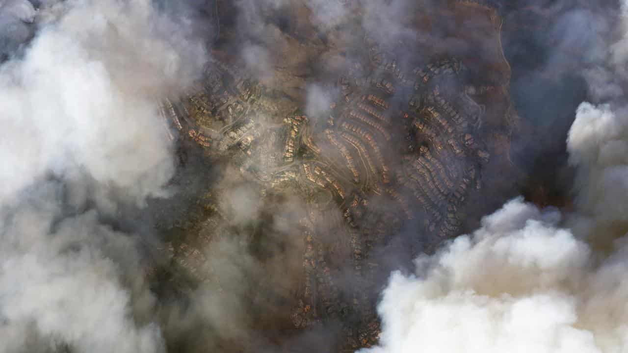 A satellite image shows smoke from the Palisades Fire