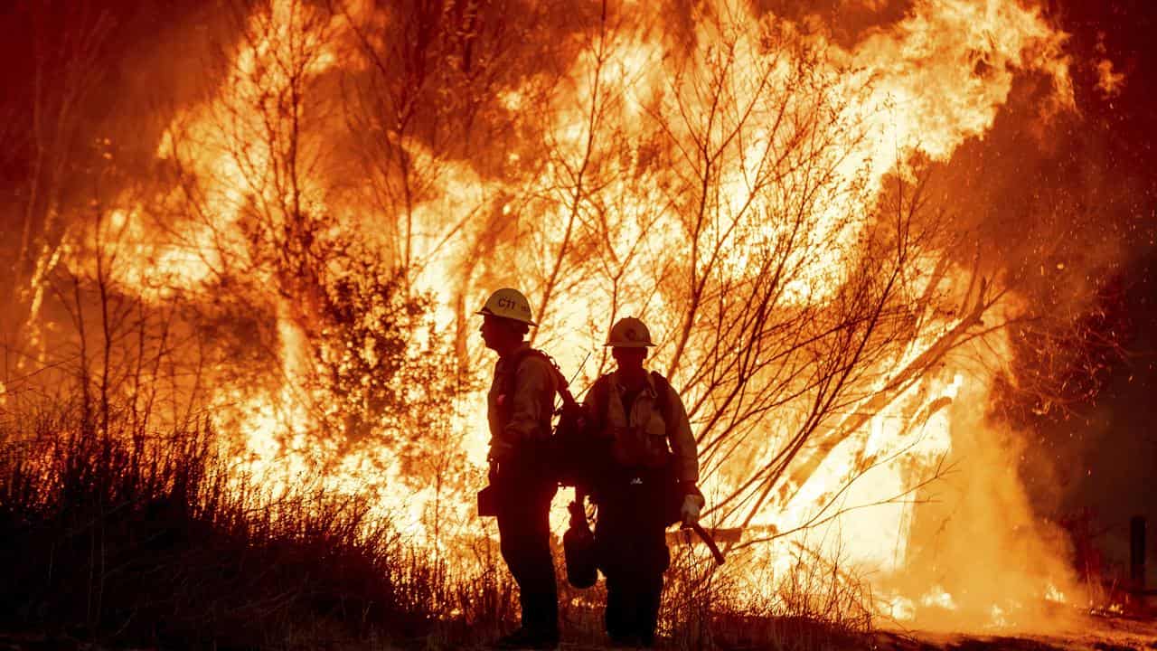 Fire crews battle the Kenneth Fire in Los Angeles