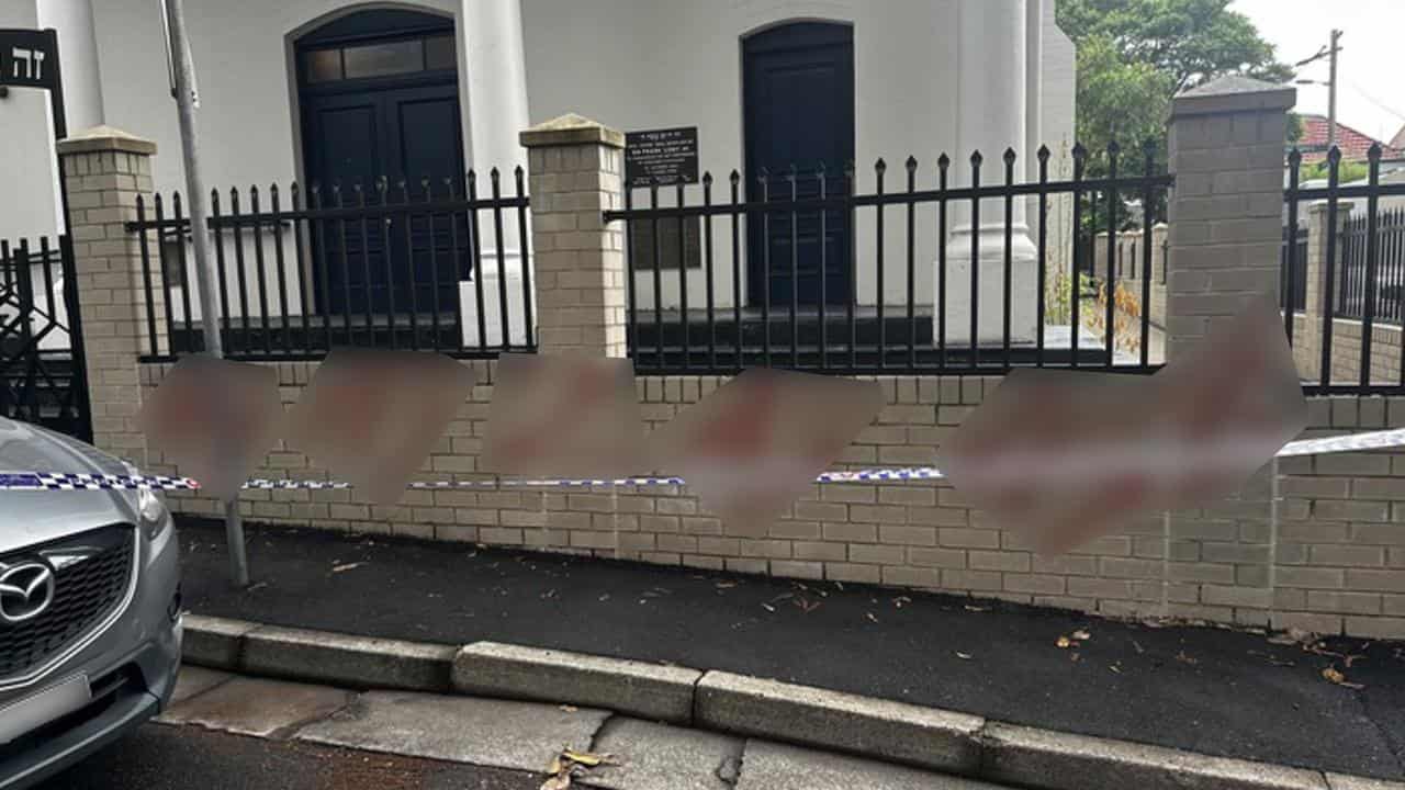 A blurred photo of swastikas painted on Newtown Synagogue in Sydney