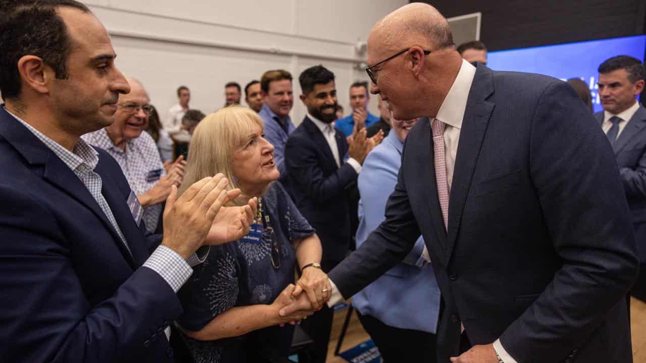 Peter Dutton greeting people at the Liberal Party rally