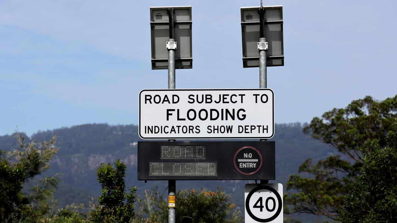 Flooded road sign