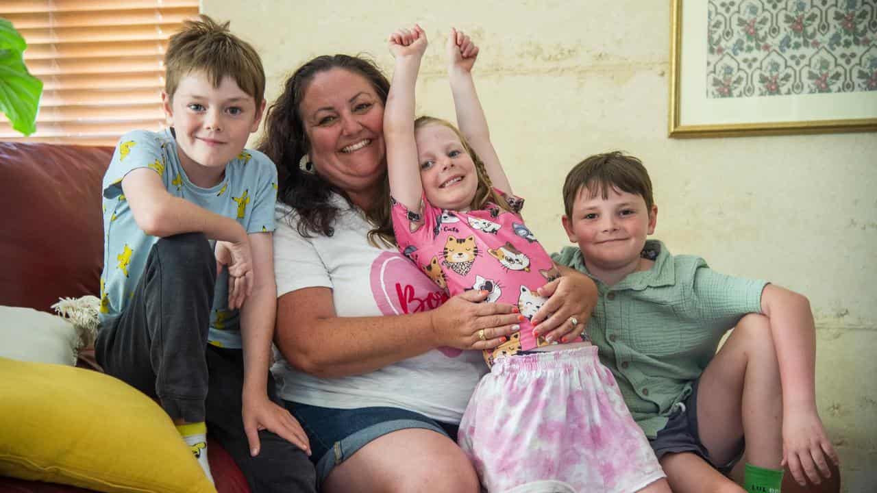 Monique Forde, and her three children