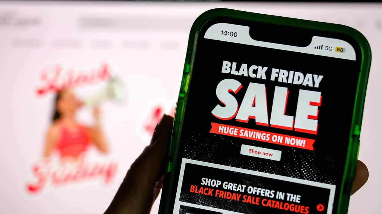 Advertisements for Black Friday sales online on a mobile phone screen