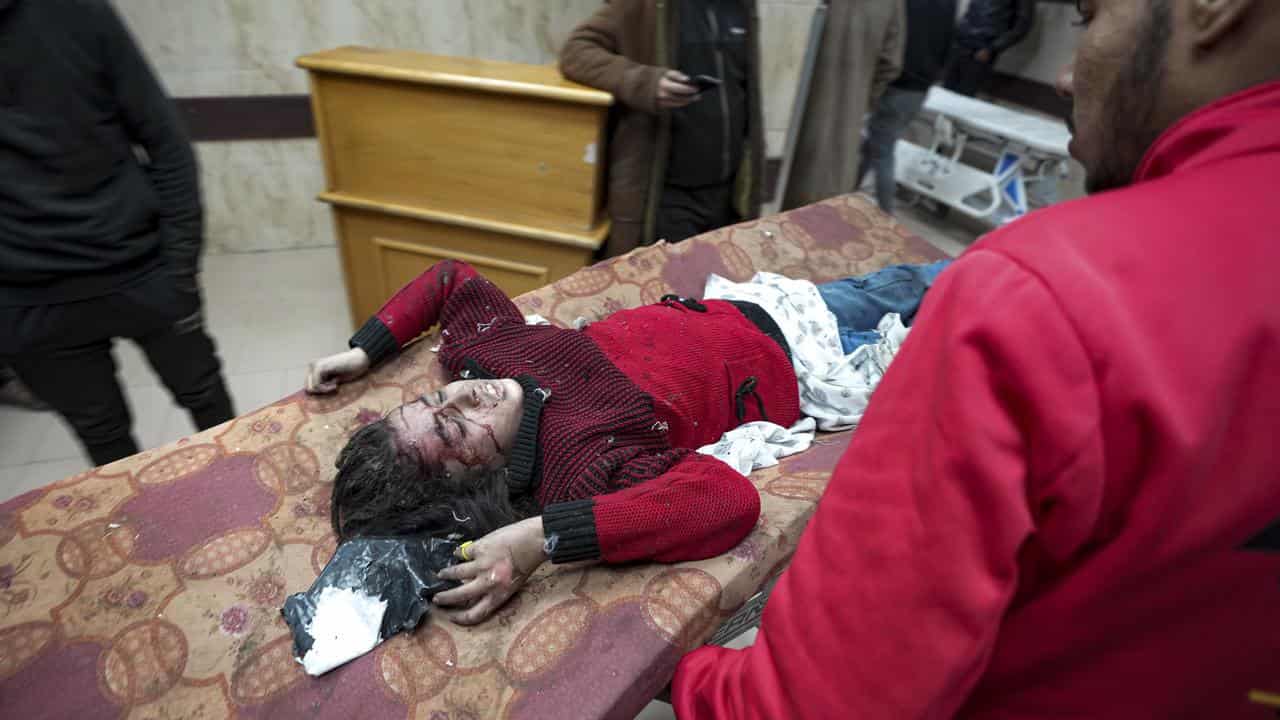 A Palestinian girl wounded in an Israeli strike