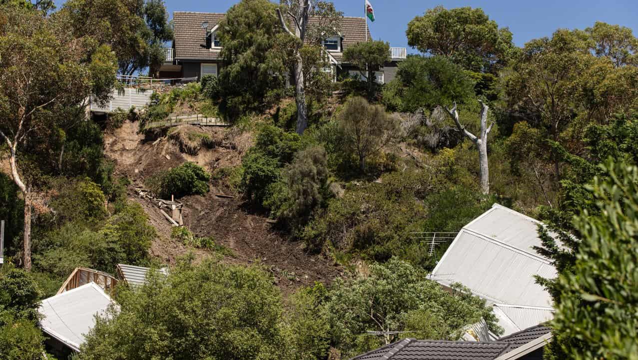 A house collapsed down a cliff at McCrae