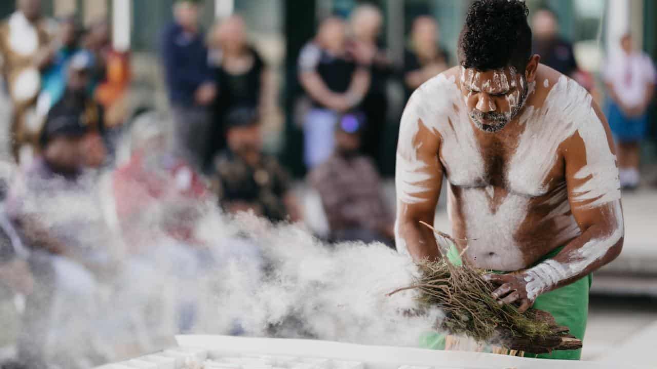 A ceremony for corals returned to Australia.