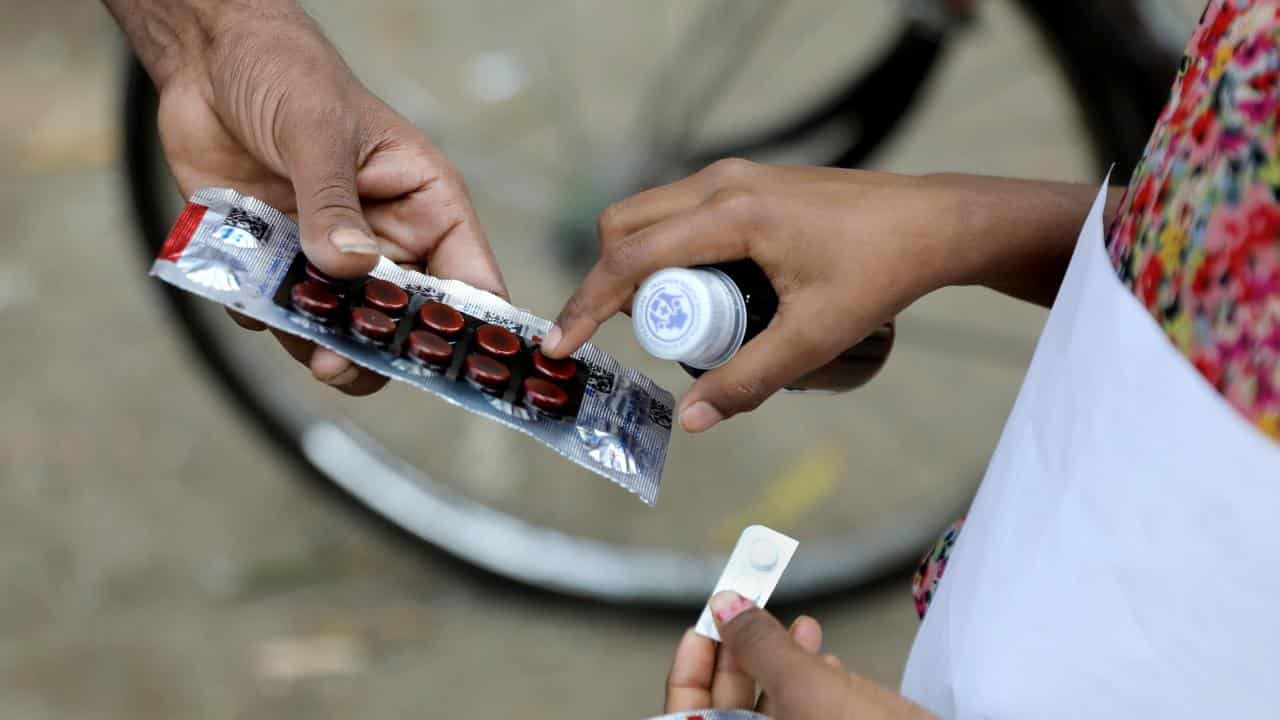 A patient receiving medicine.