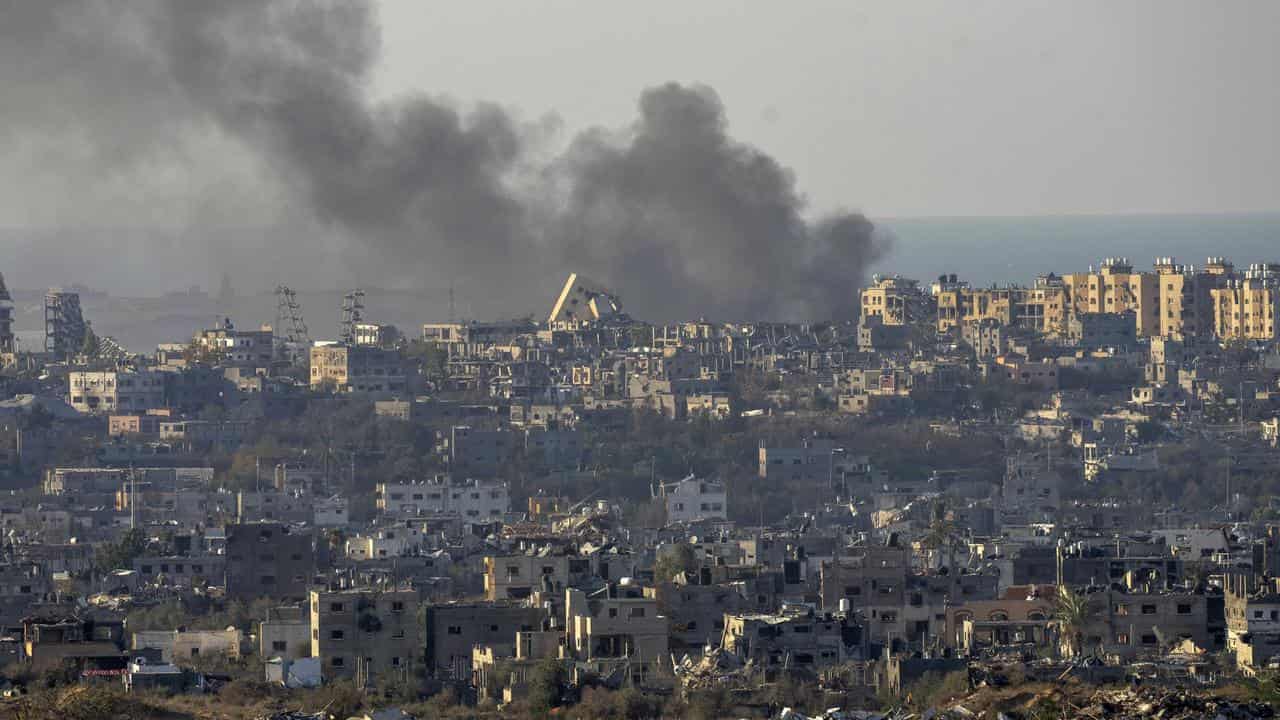 Smoke rises following an explosion in the Gaza Strip