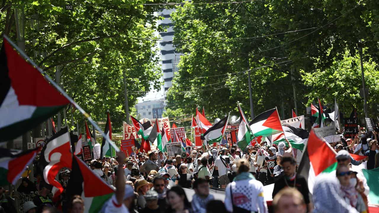 Protesters march during a rally for Palestine in Melbourne