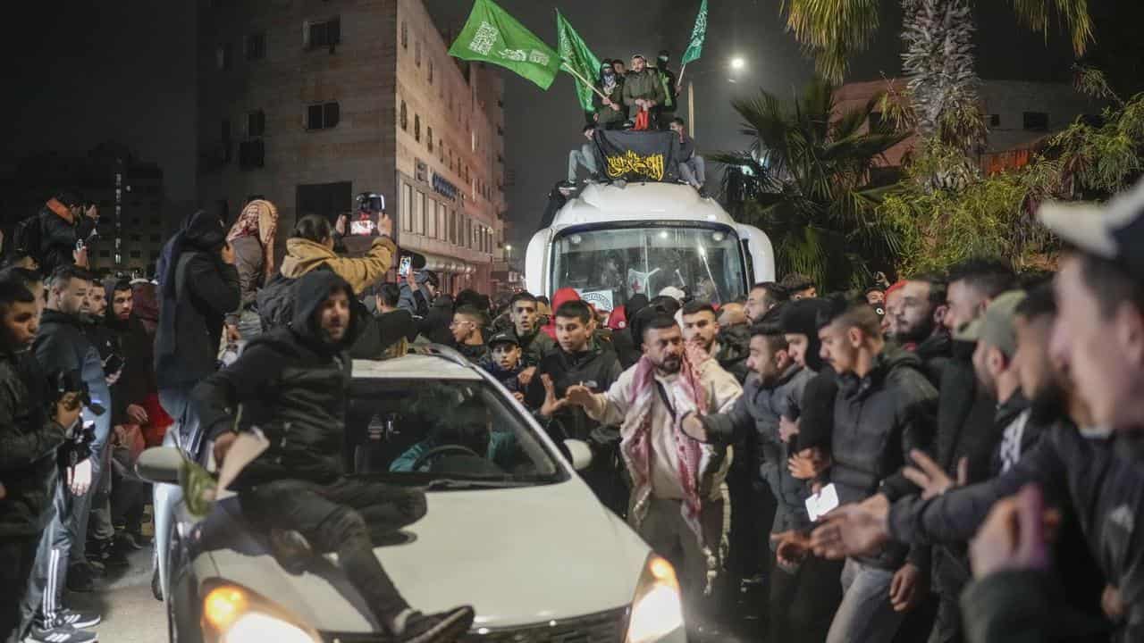 A bus carrying released Palestinian prisoners