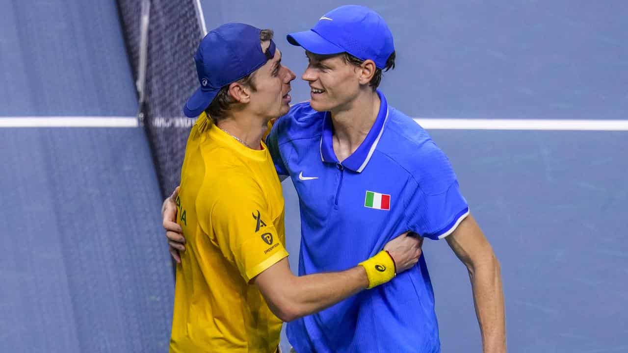 Alex de Minaur (L) and Jannik Sinner