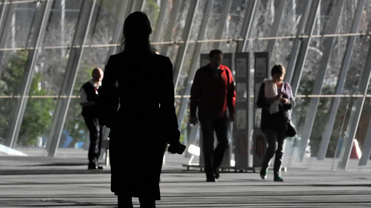 Business woman walking in Melbourne