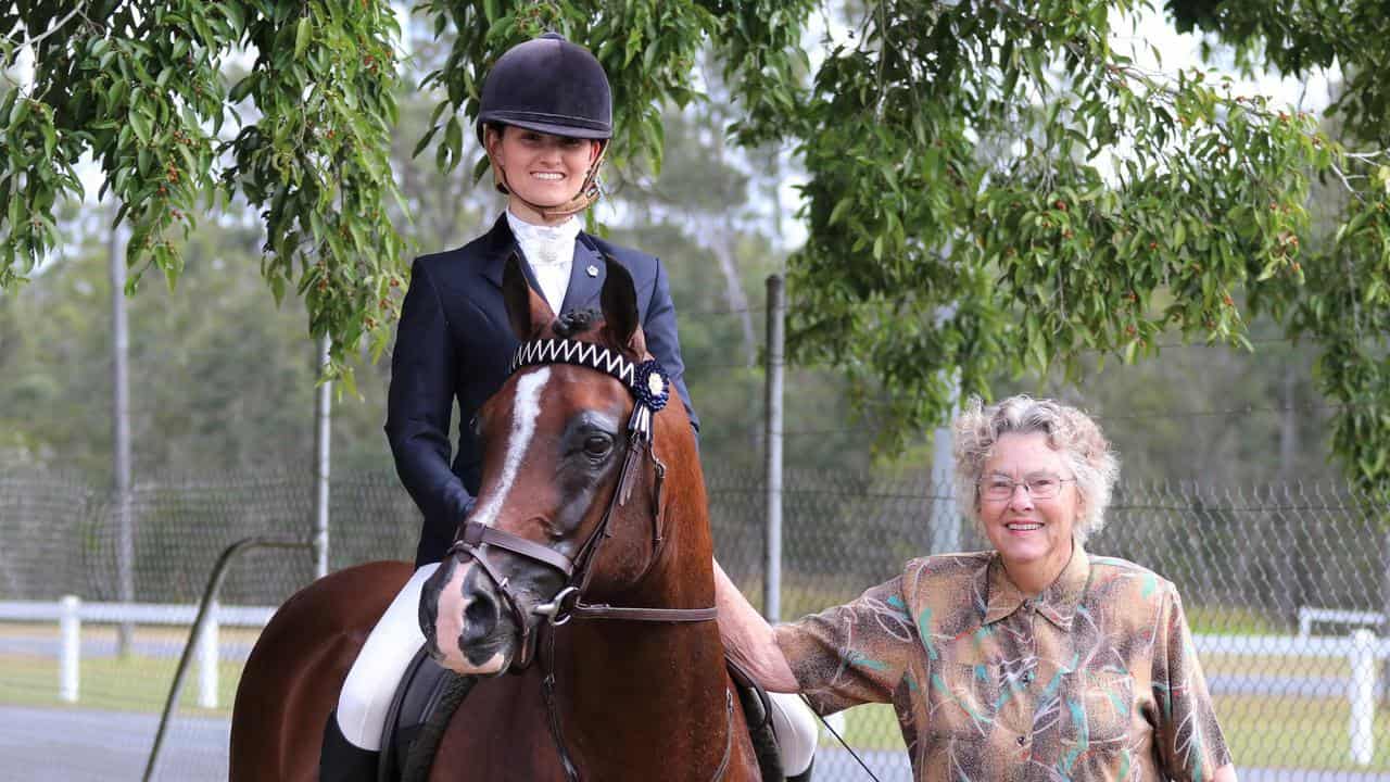 Phyllis Hopf, right, with her Stallion Count Crysdafa