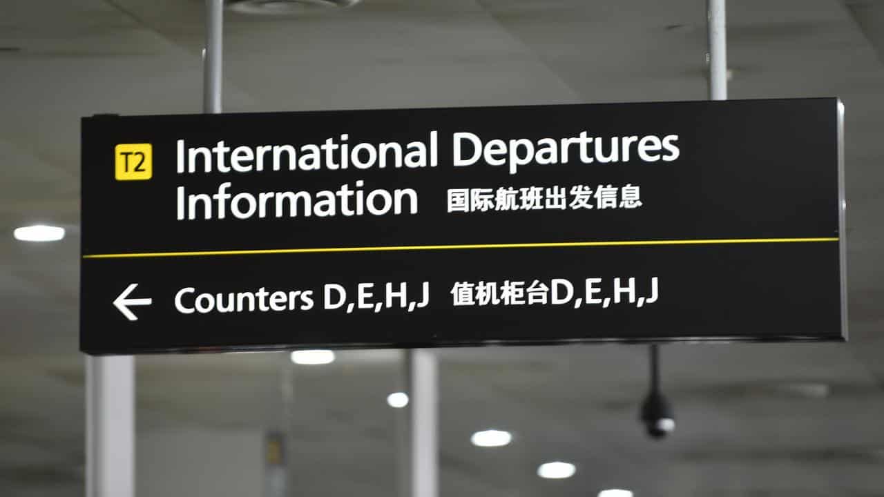 Signage for international departures at airport