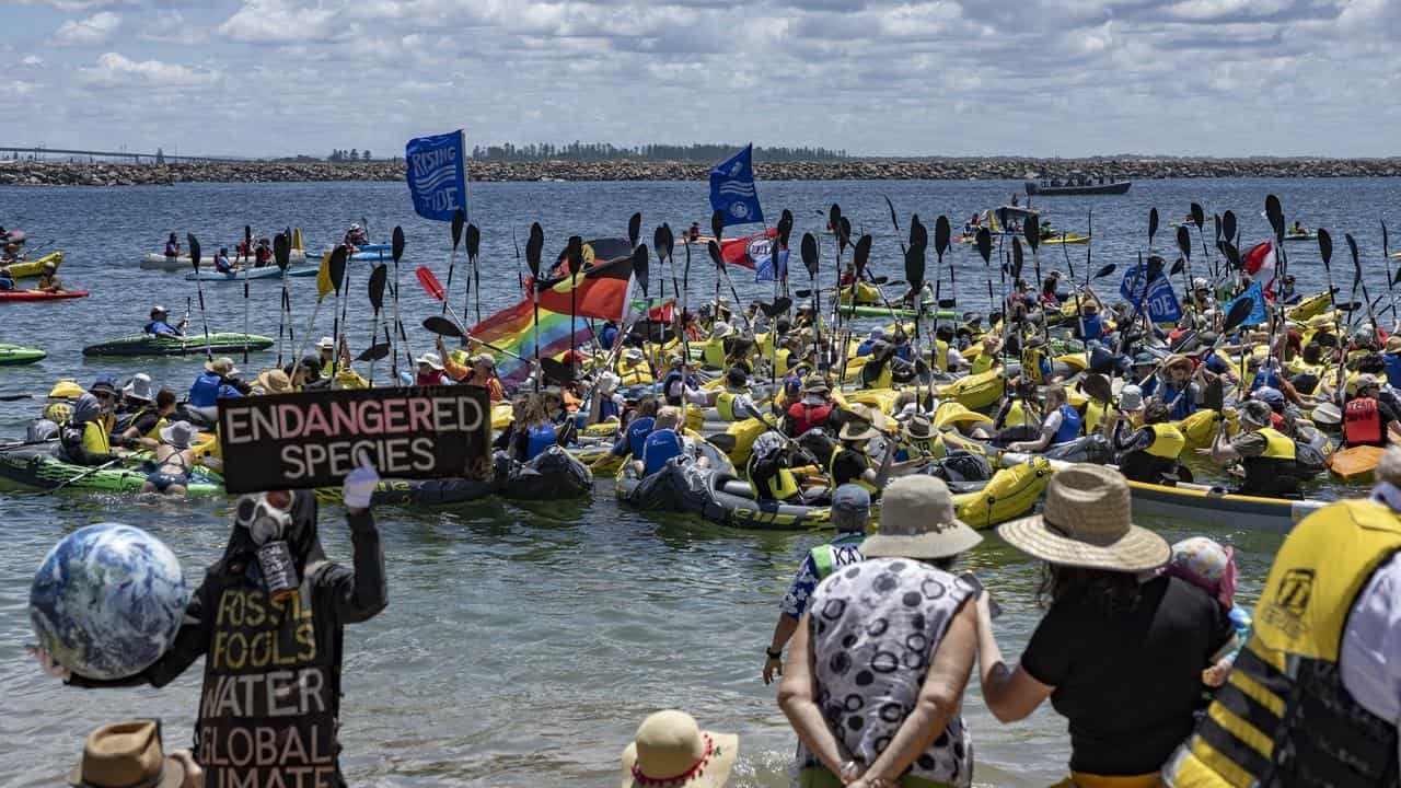 Protesters gather during a coal export blockade in Newcastle